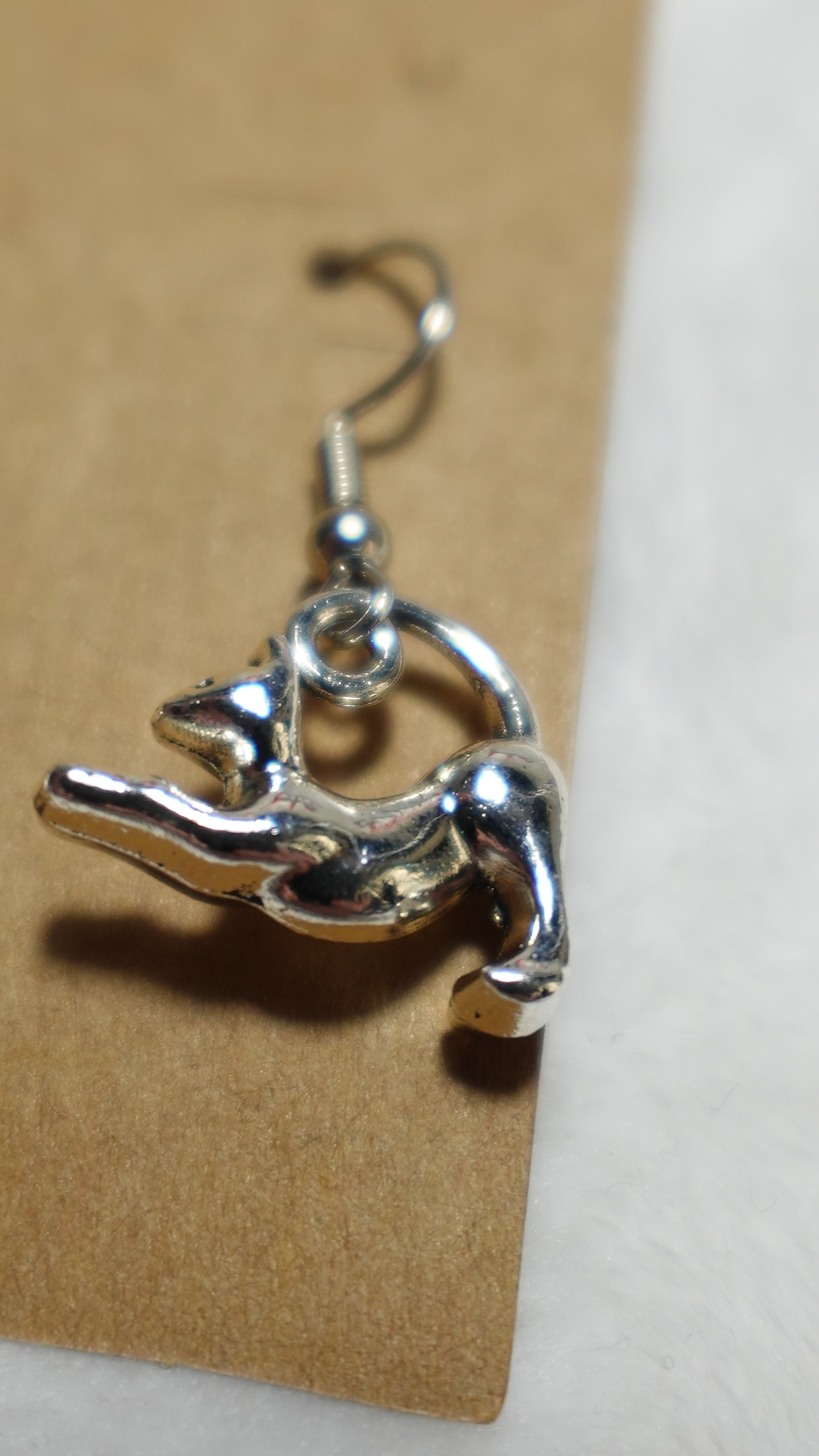 Stretching cat earrings
